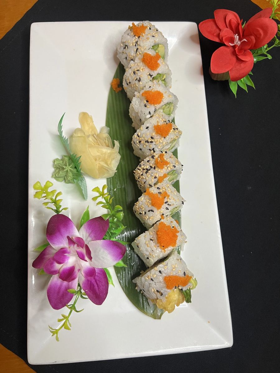 Salmon and avocado roll with shrimp tempura tail