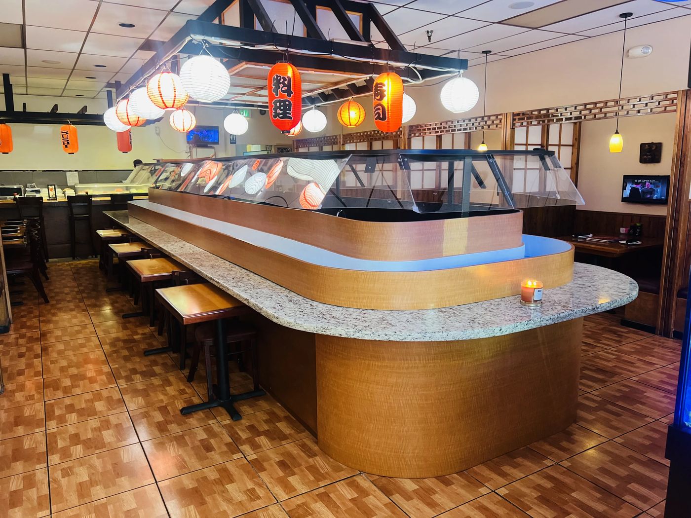 Inside The King and I — the sushi bar under paper lanterns