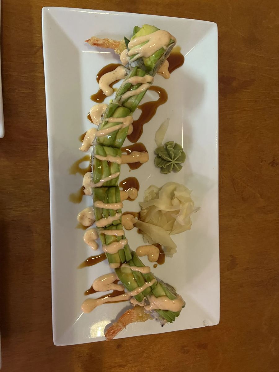 Assorted sushi and nigiri plate — salmon, tuna, and yellowtail