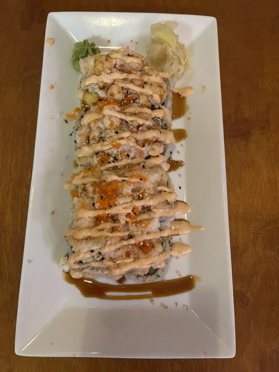 Deep-fried tempura roll with cream cheese and eel sauce